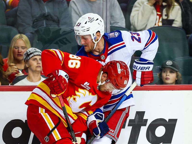 Oct 26, 2025; Calgary, Alberta, CAN; Calgary Flames left wing Joel Farabee (86) and New York Rangers defenseman Adam Fox (23) battles for the puck during the third period at Scotiabank Saddledome. Mandatory Credit: Sergei Belski-Imagn Images