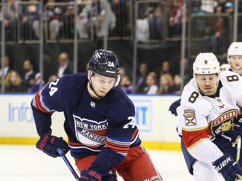 Mar 23, 2024; New York, New York, USA; New York Rangers right wing Kaapo Kakko (24) controls the puck in the second period against the Florida Panthers at Madison Square Garden. Mandatory Credit: Wendell Cruz-USA TODAY Sports