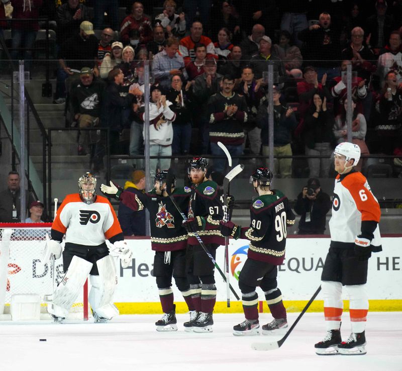 Dec 7, 2023; Tempe, Arizona, USA; Arizona Coyotes left wing Lawson Crouse (67) celebrates his goal against the Philadelphia Flyers during the first period at Mullett Arena. Mandatory Credit: Joe Camporeale-USA TODAY Sports