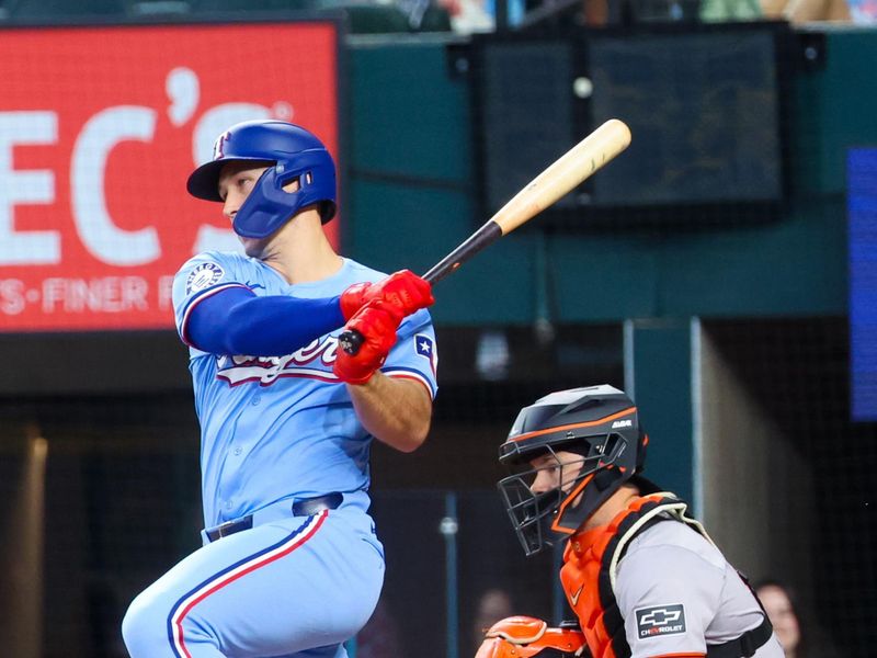 Jun 9, 2024; Arlington, Texas, USA; Texas Rangers designated hitter Wyatt Langford (36) his a two-run double during the first inning against the San Francisco Giants at Globe Life Field. Mandatory Credit: Kevin Jairaj-USA TODAY Sports