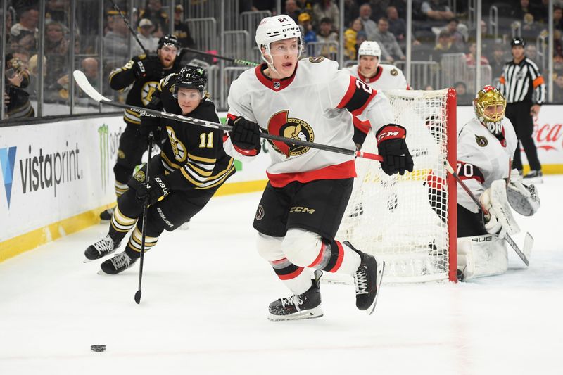 Mar 19, 2024; Boston, Massachusetts, USA;  Ottawa Senators defenseman Jacob Bernard-Docker (24) looks for an open teammate during the third period against the Boston Bruins at TD Garden. Mandatory Credit: Bob DeChiara-USA TODAY Sports