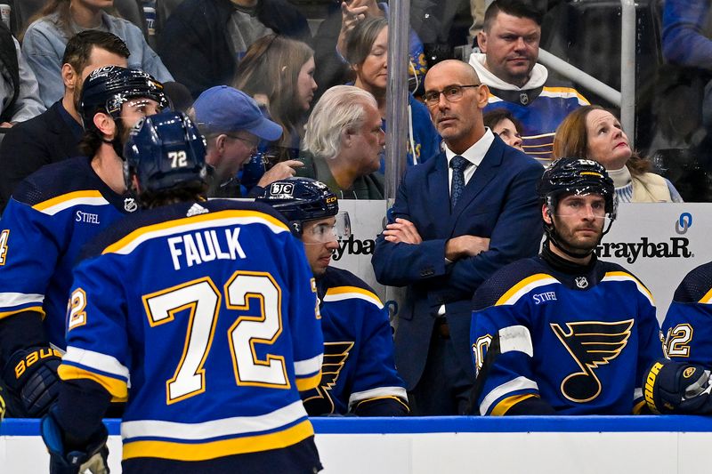 Dec 14, 2023; St. Louis, Missouri, USA;  St. Louis Blues interim head coach Drew Bannister looks on from the bench during the first period against the Ottawa Senators at Enterprise Center. Mandatory Credit: Jeff Curry-USA TODAY Sports