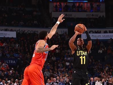 OKLAHOMA CITY, OK - DECEMBER 11: Kris Dunn #11 of the Utah Jazz shoots the ball during the game against the Oklahoma City Thunder on December 11, 2023 at Paycom Arena in Oklahoma City, Oklahoma. NOTE TO USER: User expressly acknowledges and agrees that, by downloading and or using this photograph, User is consenting to the terms and conditions of the Getty Images License Agreement. Mandatory Copyright Notice: Copyright 2023 NBAE (Photo by Zach Beeker/NBAE via Getty Images)