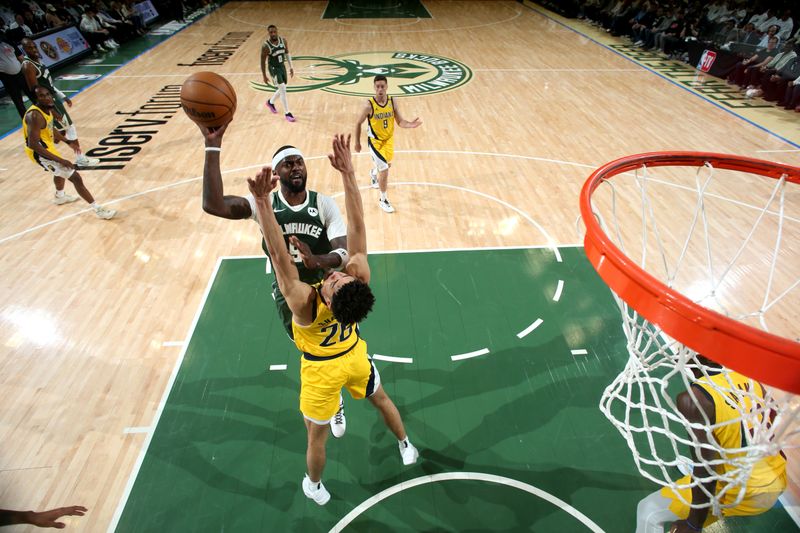 MILWAUKEE, WI - APRIL 23: Bobby Portis #9 of the Milwaukee Bucks shoots the ball during the game against the Indiana Pacers during Round One Game Two of the 2024 NBA Playoffs on April 23, 2024 at the Fiserv Forum Center in Milwaukee, Wisconsin. NOTE TO USER: User expressly acknowledges and agrees that, by downloading and or using this Photograph, user is consenting to the terms and conditions of the Getty Images License Agreement. Mandatory Copyright Notice: Copyright 2024 NBAE (Photo by Gary Dineen/NBAE via Getty Images).