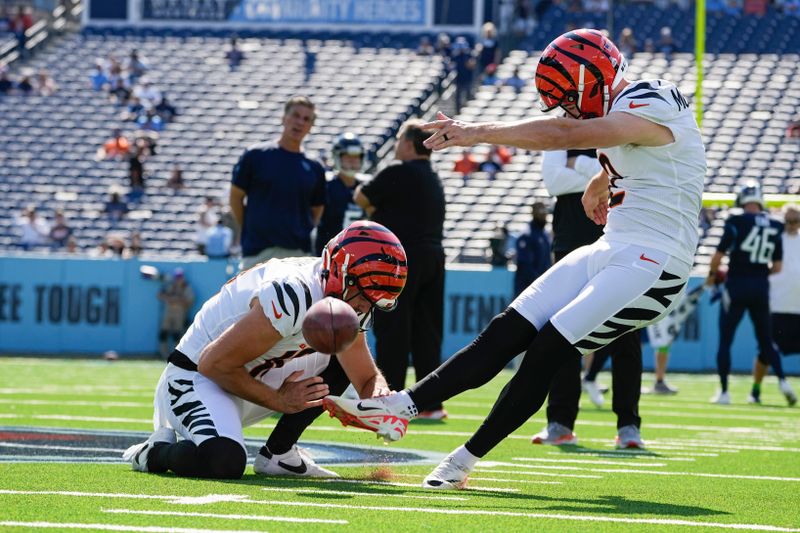 Cincinnati Bengals place kicker Evan McPherson (2) warms up before an NFL football game between the Tennessee Titans and the Cincinnati Bengals, Sunday, Oct. 1, 2023, in Nashville, Tenn. (AP Photo/George Walker IV)