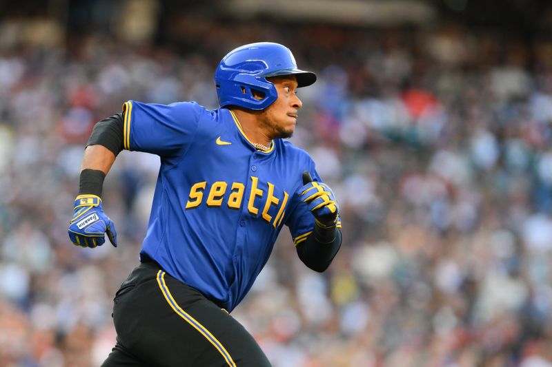 Jul 19, 2024; Seattle, Washington, USA; Seattle Mariners second baseman Jorge Polanco (7) runs the bases after hitting a double against the Houston Astros during the second inning at T-Mobile Park. Mandatory Credit: Steven Bisig-USA TODAY Sports