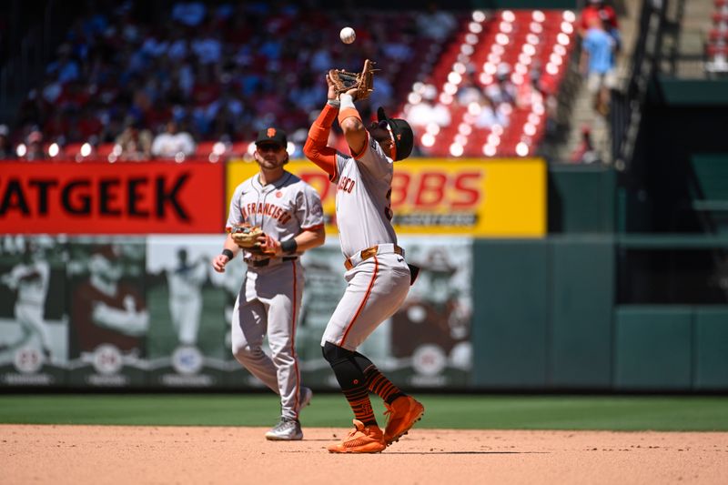 Jun 23, 2024; St. Louis, Missouri, USA; San Francisco Giants second baseman Thairo Estrada (39) catches a pop-up by the St. Louis Cardinals in the seventh inning at Busch Stadium. Mandatory Credit: Joe Puetz-USA TODAY Sports