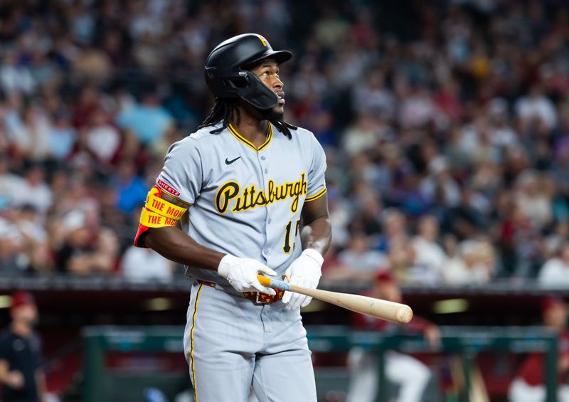 May 28, 2025; Phoenix, Arizona, USA; Pittsburgh Pirates outfielder Oneil Cruz hits a two run home run in the eighth inning against the Arizona Diamondbacks at Chase Field. Mandatory Credit: Mark J. Rebilas-Imagn Images