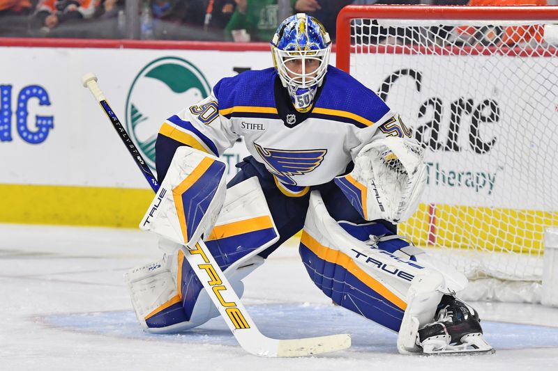 Mar 4, 2024; Philadelphia, Pennsylvania, USA; St. Louis Blues goaltender Jordan Binnington (50) against the Philadelphia Flyers during the second period at Wells Fargo Center. Mandatory Credit: Eric Hartline-USA TODAY Sports