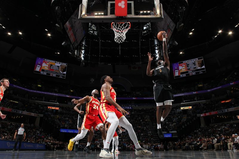 MEMPHIS, TN - MARCH 8: Vince Williams Jr. #5 of the Memphis Grizzlies drives to the basket during the game against the Atlanta Hawks on March 8, 2024 at FedExForum in Memphis, Tennessee. NOTE TO USER: User expressly acknowledges and agrees that, by downloading and or using this photograph, User is consenting to the terms and conditions of the Getty Images License Agreement. Mandatory Copyright Notice: Copyright 2024 NBAE (Photo by Joe Murphy/NBAE via Getty Images)