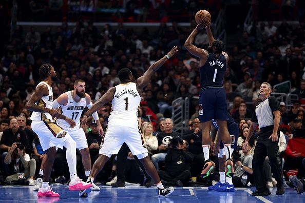 LOS ANGELES, CALIFORNIA - NOVEMBER 24: James Harden #1 of the Los Angeles Clippers attempts a three point basket against Zion Williamson #1 of the New Orleans Pelicans in the second quarter during an NBA In-Season Tournament game at Crypto.com Arena on November 24, 2023 in Los Angeles, California. NOTE TO USER: User expressly acknowledges and agrees that, by downloading and or using this photograph, User is consenting to the terms and conditions of the Getty Images License Agreement.  (Photo by Katelyn Mulcahy/Getty Images)