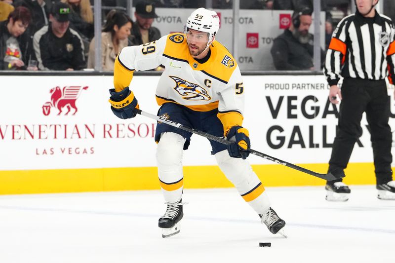 Feb 20, 2024; Las Vegas, Nevada, USA; Nashville Predators defenseman Roman Josi (59) skates against the Vegas Golden Knights during the first period at T-Mobile Arena. Mandatory Credit: Stephen R. Sylvanie-USA TODAY Sports