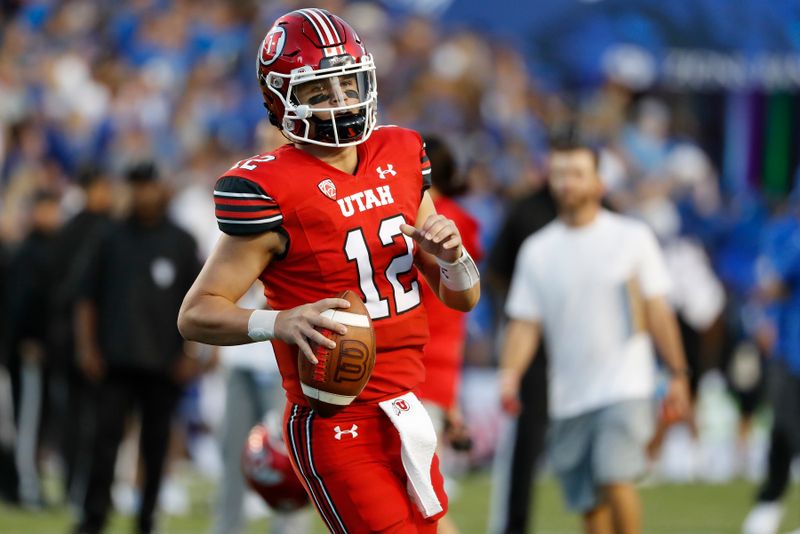 Sep 11, 2021; Provo, Utah, USA; Utah Utes quarterback Charlie Brewer (12) prepares for their game against the Brigham Young Cougars at LaVell Edwards Stadium. Mandatory Credit: Jeffrey Swinger-USA TODAY Sports