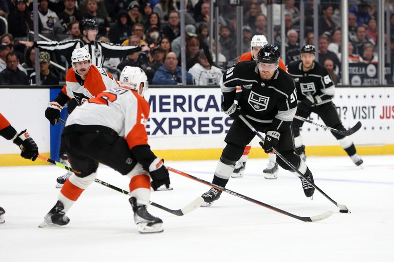 Nov 11, 2023; Los Angeles, California, USA;  Los Angeles Kings right wing Carl Grundstrom (91) scores a goal during the second period against the Philadelphia Flyers at Crypto.com Arena. Mandatory Credit: Kiyoshi Mio-USA TODAY Sports