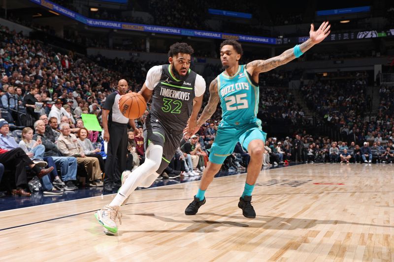 MINNEAPOLIS, MN -  JANUARY 22: Karl-Anthony Towns #32 of the Minnesota Timberwolves drives to the basket during the game against the Charlotte Hornets on January 22, 2024 at Target Center in Minneapolis, Minnesota. NOTE TO USER: User expressly acknowledges and agrees that, by downloading and or using this Photograph, user is consenting to the terms and conditions of the Getty Images License Agreement. Mandatory Copyright Notice: Copyright 2024 NBAE (Photo by David Sherman/NBAE via Getty Images)