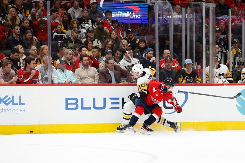 Apr 4, 2024; Washington, District of Columbia, USA; Washington Capitals defenseman Nick Jensen (3) checks Pittsburgh Penguins left wing Drew O'Connor (10) while battling for the puck in the second period at Capital One Arena. Mandatory Credit: Geoff Burke-USA TODAY Sports