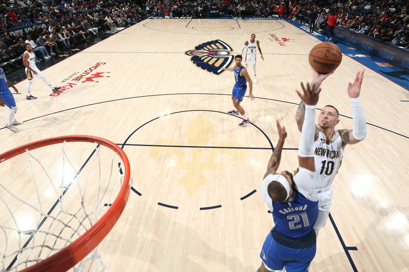 NEW ORLEANS, LA - JANUARY 15:  Daniel Theis #10 of the New Orleans Pelicans shoots the ball during the game against the Dallas Mavericks on January 15, 2025 at the Smoothie King Center in New Orleans, Louisiana. NOTE TO USER: User expressly acknowledges and agrees that, by downloading and or using this Photograph, user is consenting to the terms and conditions of the Getty Images License Agreement. Mandatory Copyright Notice: Copyright 2025 NBAE (Photo by Layne Murdoch Jr./NBAE via Getty Images)