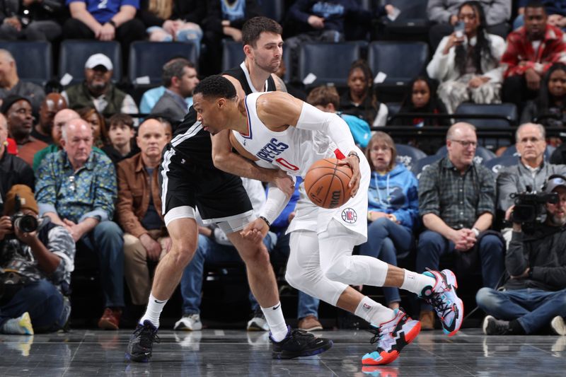 MEMPHIS, TN - FEBRUARY 23:  Russell Westbrook #0 of the LA Clippers dribbles the ball during the game against the Memphis Grizzlies on February 23, 2024 at FedExForum in Memphis, Tennessee. NOTE TO USER: User expressly acknowledges and agrees that, by downloading and or using this photograph, User is consenting to the terms and conditions of the Getty Images License Agreement. Mandatory Copyright Notice: Copyright 2024 NBAE (Photo by Joe Murphy/NBAE via Getty Images)