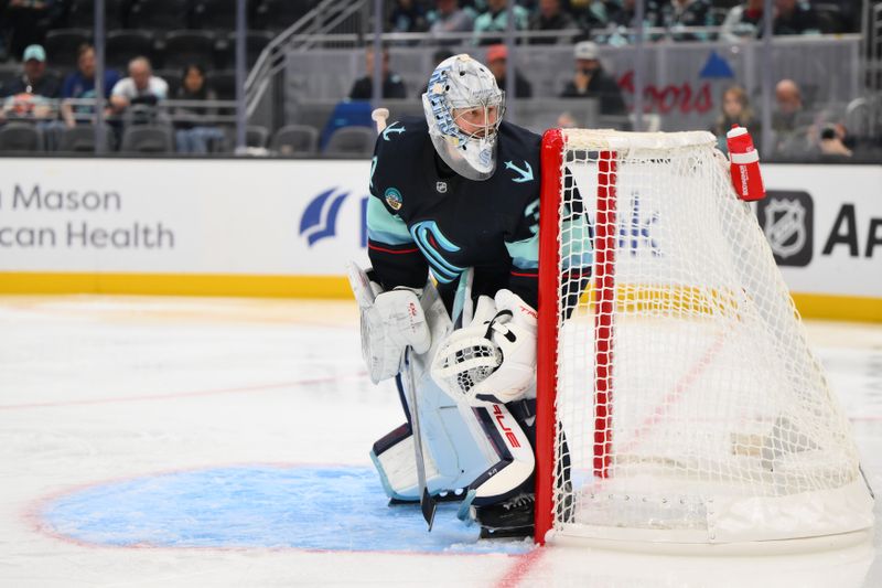 Oct 2, 2024; Seattle, Washington, USA; Seattle Kraken goaltender Philipp Grubauer (31) defends the goal against the Edmonton Oilers  during the second period at Climate Pledge Arena. Mandatory Credit: Steven Bisig-Imagn Images