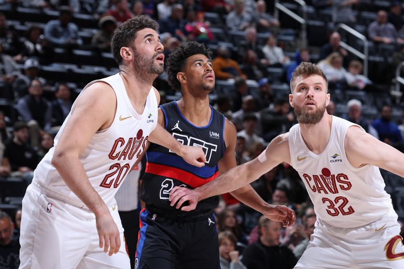 DETROIT, MI - MARCH 1: Georges Niang #20 and Dean Wade #32 of the Cleveland Cavaliers box out during the game against the Detroit Pistons on March 1, 2024 at Little Caesars Arena in Detroit, Michigan. NOTE TO USER: User expressly acknowledges and agrees that, by downloading and/or using this photograph, User is consenting to the terms and conditions of the Getty Images License Agreement. Mandatory Copyright Notice: Copyright 2024 NBAE (Photo by Jeff Haynes/NBAE via Getty Images)