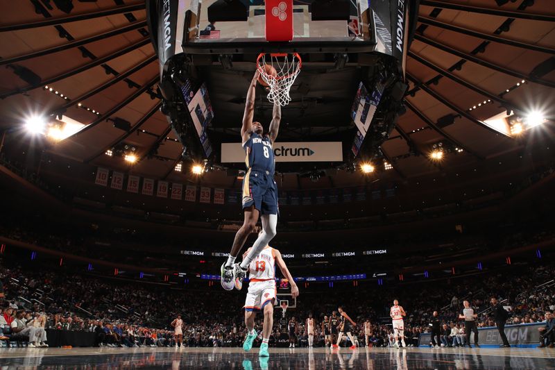 NEW YORK, NY - DECEMBER 1: Jamal Cain #8 of the New Orleans Pelicans dunks the ball during the game against the New York Knicks on December 1, 2024 at Madison Square Garden in New York City, New York.  NOTE TO USER: User expressly acknowledges and agrees that, by downloading and or using this photograph, User is consenting to the terms and conditions of the Getty Images License Agreement. Mandatory Copyright Notice: Copyright 2024 NBAE  (Photo by Nathaniel S. Butler/NBAE via Getty Images)