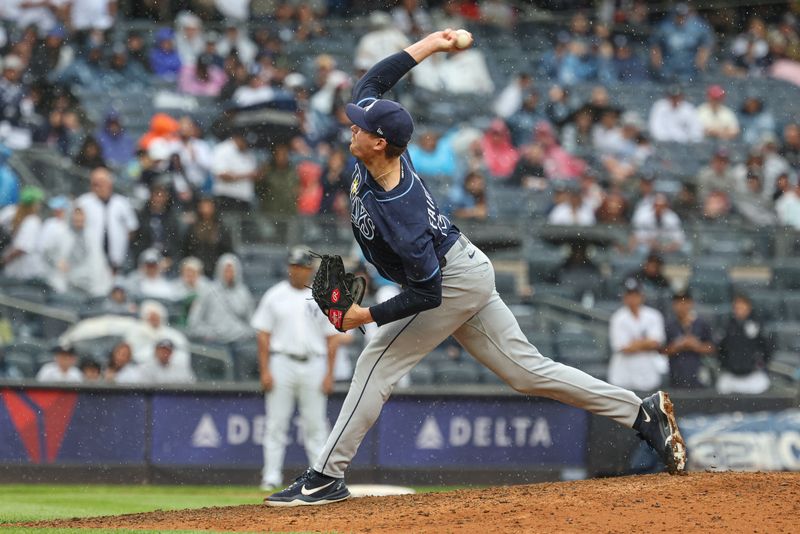 May 4, 2025; Bronx, New York, USA; Tampa Bay Rays relief pitcher Pete Fairbanks (29) delivers a pitch during the ninth inning against the New York Yankees at Yankee Stadium. Mandatory Credit: Vincent Carchietta-Imagn Images