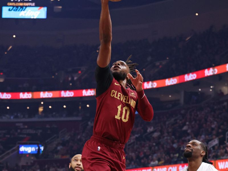 CLEVELAND, OH - March 8: Darius Garland #10 of the Cleveland Cavaliers drives to the basket during the game against the Minnesota Timberwolves on March 8, 2024 at Rocket Mortgage FieldHouse in Cleveland, Ohio. NOTE TO USER: User expressly acknowledges and agrees that, by downloading and/or using this Photograph, user is consenting to the terms and conditions of the Getty Images License Agreement. Mandatory Copyright Notice: Copyright 2024 NBAE (Photo by Lauren Leigh Bacho/NBAE via Getty Images)