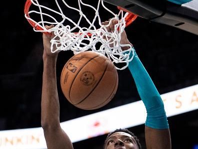 CHARLOTTE, NORTH CAROLINA - NOVEMBER 22: Brandon Miller #24 of the Charlotte Hornets dunks the ball in the third quarter during their game against the Washington Wizards at Spectrum Center on November 22, 2023 in Charlotte, North Carolina. NOTE TO USER: User expressly acknowledges and agrees that, by downloading and or using this photograph, User is consenting to the terms and conditions of the Getty Images License Agreement. (Photo by Jacob Kupferman/Getty Images)