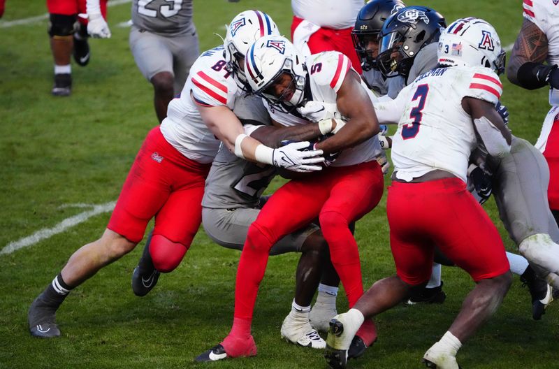 Nov 11, 2023; Boulder, Colorado, USA; Arizona Wildcats wide receiver Montana Lemonious-Craig (5) carries the ball in the fourth quarter against the Colorado Buffaloes at Folsom Field. Mandatory Credit: Ron Chenoy-USA TODAY Sports