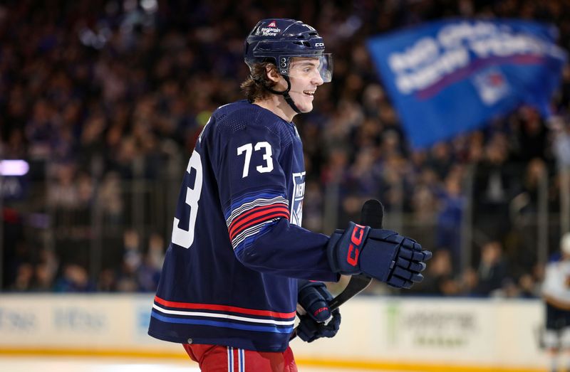 Mar 9, 2024; New York, New York, USA; New York Rangers center Matt Rempe (73) celebrates a goal that was later overturned by replay during the second period against the St. Louis Blues at Madison Square Garden. Mandatory Credit: Danny Wild-USA TODAY Sports