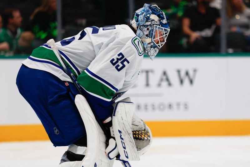 Oct 16, 2025; Dallas, Texas, USA; Vancouver Canucks goaltender Thatcher Demko (35) faces the team attack against the Dallas Stars during the second period at American Airlines Center. Mandatory Credit: Chris Jones-Imagn Images