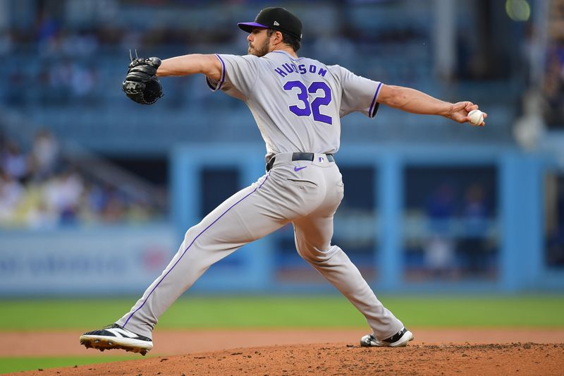 May 31, 2024; Los Angeles, California, USA; Colorado Rockies pitcher Dakota Hudson (32) throws against the Los Angeles Dodgers during the second inning at Dodger Stadium. Mandatory Credit: Gary A. Vasquez-USA TODAY Sports