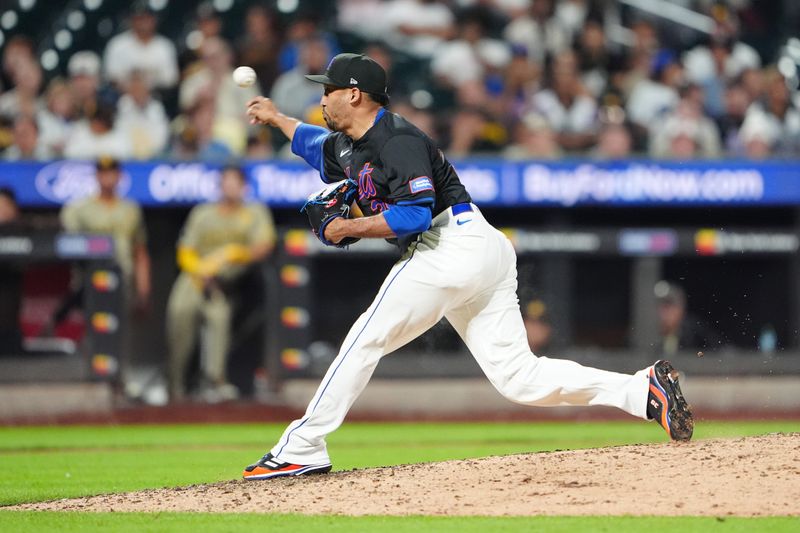 Jun 14, 2024; New York City, New York, USA; New York Mets pitcher Edwin Diaz (39) delivers a pitch against the San Diego Padres during the ninth inning at Citi Field. Mandatory Credit: Gregory Fisher-USA TODAY Sports