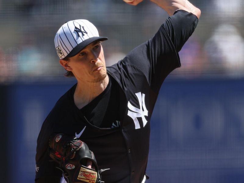 Mar 18, 2025; Tampa, Florida, USA; New York Yankees pitcher Max Fried (54) throws a pitch against the Boston Red Sox in the third inning  during spring training at George M. Steinbrenner Field. Mandatory Credit: Nathan Ray Seebeck-Imagn Images