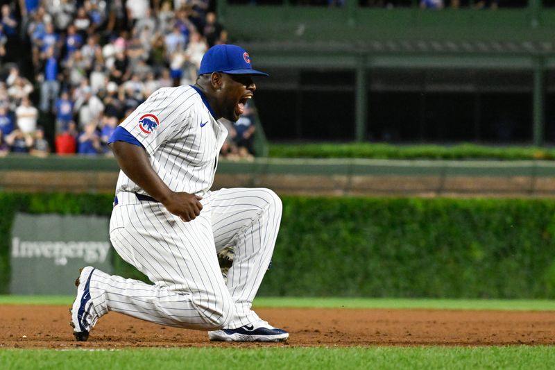 Jul 22, 2024; Chicago, Illinois, USA;  Chicago Cubs pitcher Héctor Neris (51) reacts after the game against the Milwaukee Brewers at Wrigley Field. Mandatory Credit: Matt Marton-USA TODAY Sports