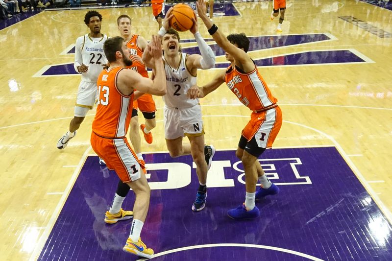Jan 14, 2026; Evanston, Illinois, USA; Illinois Fighting Illini center Tomislav Ivisic (13) guard Andrej Stojakovic (2) defends Northwestern Wildcats forward Nick Martinelli (2) during the first half at Welsh-Ryan Arena. Mandatory Credit: David Banks-Imagn Images