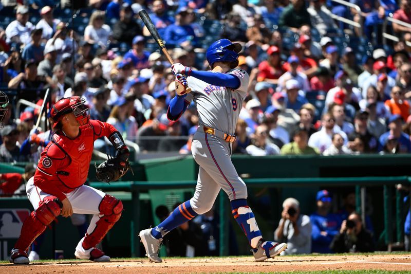 Apr 27, 2025; Washington, District of Columbia, USA; New York Mets left fielder Brandon Nimmo (9) hits a RBI sacrifice fly against the Washington Nationals during the first inning  at Nationals Park. Mandatory Credit: Brad Mills-Imagn Images