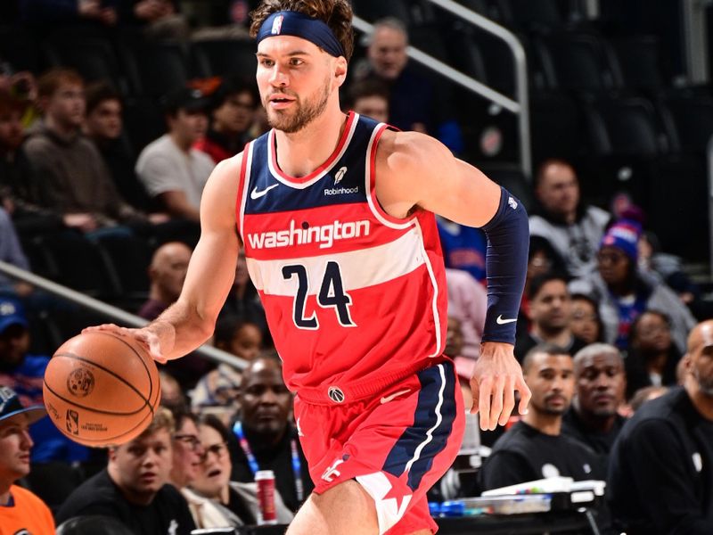 DETROIT, MI - JANUARY 27: Corey Kispert #24 of the Washington Wizards dribbles the ball during the game against the Detroit Pistons on January 27, 2024 at Little Caesars Arena in Detroit, Michigan. NOTE TO USER: User expressly acknowledges and agrees that, by downloading and/or using this photograph, User is consenting to the terms and conditions of the Getty Images License Agreement. Mandatory Copyright Notice: Copyright 2024 NBAE (Photo by Chris Schwegler/NBAE via Getty Images)