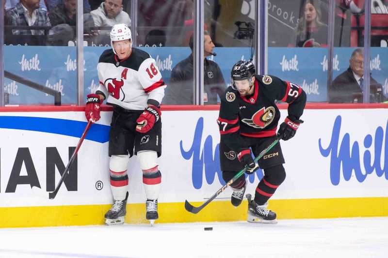 Oct 17, 2024; Ottawa, Ontario, CAN; Ottawa Senators left wing David Perron (57) skates with the puck away from New Jersey Devils left wing Ondrej Palat (18) in the first period at the Canadian Tire Centre. Mandatory Credit: Marc DesRosiers-Imagn Images