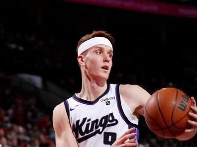 PORTLAND, OR - DECEMBER 26: Kevin Huerter #9 of the Sacramento Kings handles the ball during the game against the Portland Trail Blazers on December 26, 2023 at the Moda Center Arena in Portland, Oregon. NOTE TO USER: User expressly acknowledges and agrees that, by downloading and or using this photograph, user is consenting to the terms and conditions of the Getty Images License Agreement. Mandatory Copyright Notice: Copyright 2023 NBAE (Photo by Cameron Browne/NBAE via Getty Images)