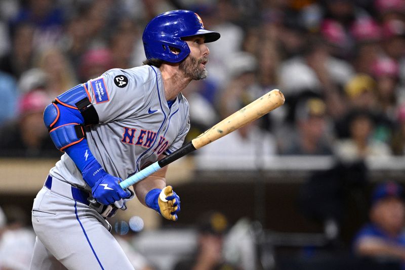 Aug 22, 2024; San Diego, California, USA; New York Mets right fielder Jeff McNeil (1) hits an RBI single against the San Diego Padres during the fourth inning at Petco Park. Mandatory Credit: Orlando Ramirez-USA TODAY Sports