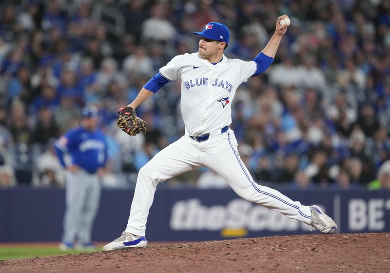 May 1, 2024; Toronto, Ontario, CAN; Toronto Blue Jays relief pitcher Brendon Little (54) throws a pitch against the Toronto Blue Jays during the ninth inning at Rogers Centre. Mandatory Credit: Nick Turchiaro-USA TODAY Sports
