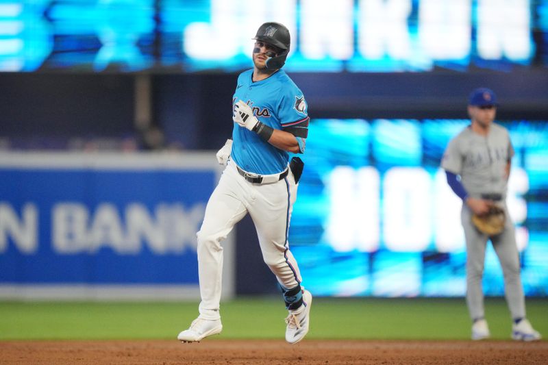 Aug 25, 2024; Miami, Florida, USA;  Miami Marlins designated hitter Connor Norby (24) rounds the bases after hitting a home run in the first inning against the Chicago Cubs at loanDepot Park. Mandatory Credit: Jim Rassol-USA TODAY Sports