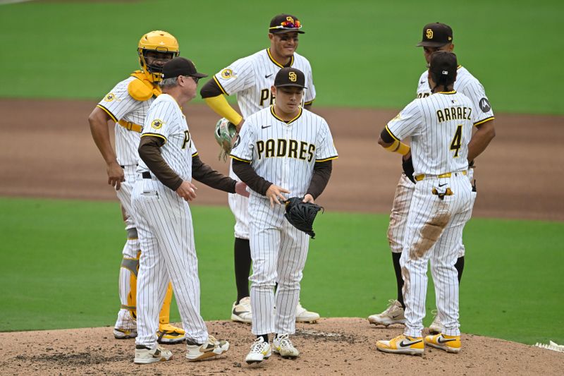 May 28, 2025; San Diego, California, USA; San Diego Padres relief pitcher Yuki Matsui (1) leaves the game during the sixth inning against the Miami Marlins at Petco Park. Mandatory Credit: Denis Poroy-Imagn Images