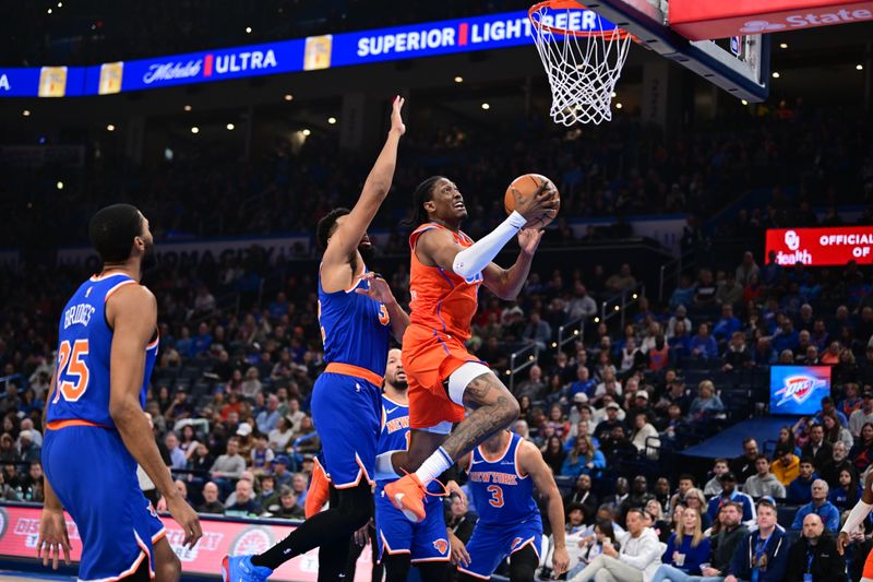 OKLAHOMA CITY, OKLAHOMA - JANUARY 03: Jalen Williams #8 of the Oklahoma City Thunder goes to the rim during the first half against the New York Knicks at Paycom Center on January 3, 2025 in Oklahoma City, Oklahoma. NOTE TO USER: User expressly acknowledges and agrees that, by downloading and or using this photograph, User is consenting to the terms and conditions of the Getty Images License Agreement. (Photo by Joshua Gateley/Getty Images)