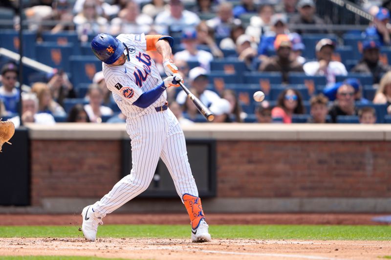 Jun 1, 2025; New York City, New York, USA; New York Mets center fielder Tyrone Taylor (15) hits a single against the Colorado Rockies during the third inning at Citi Field. Mandatory Credit: Gregory Fisher-Imagn Images