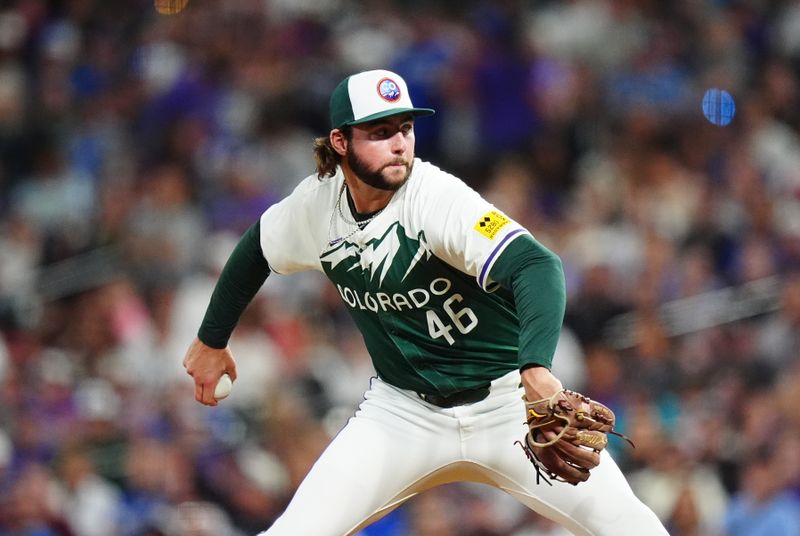 Sep 28, 2024; Denver, Colorado, USA; Colorado Rockies relief pitcher Jeff Criswell (46) delivers a pitch in the sixth inning against the Los Angeles Dodgers at Coors Field. Mandatory Credit: Ron Chenoy-Imagn Images