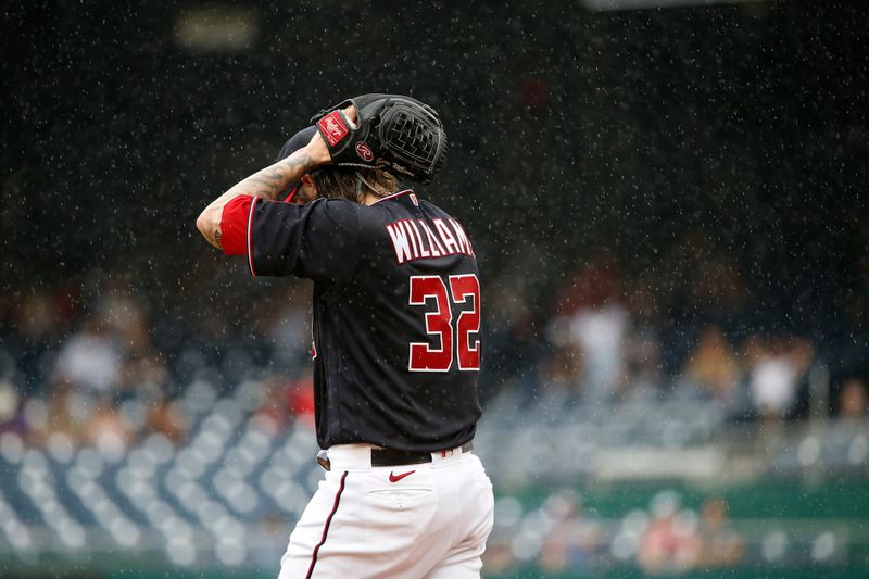 Sep 10, 2023; Washington, District of Columbia, USA; Washington Nationals starting pitcher Trevor Williams (32) reacts after being removed from the game in the fifth inning against the Los Angeles Dodgers at Nationals Park. Mandatory Credit: Amber Searls-USA TODAY Sports