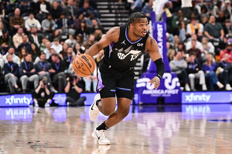 SALT LAKE CITY, UT - FEBRUARY 28:  Isaiah Collier #13 of the Utah Jazz dribbles the ball during the game against the Minnesota Timberwolves on February 28, 2025 at Delta Center in Salt Lake City, Utah. NOTE TO USER: User expressly acknowledges and agrees that, by downloading and or using this Photograph, User is consenting to the terms and conditions of the Getty Images License Agreement. Mandatory Copyright Notice: Copyright 2025 NBAE (Photo by Jamie Sabau/NBAE via Getty Images)