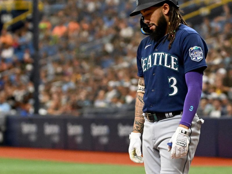 Sep 10, 2023; St. Petersburg, Florida, USA;  Seattle Mariners shortstop J.P. Crawford (3) reacts after striking out to end the sixth inning against the Tampa Bay Rays at Tropicana Field. Mandatory Credit: Jonathan Dyer-USA TODAY Sports